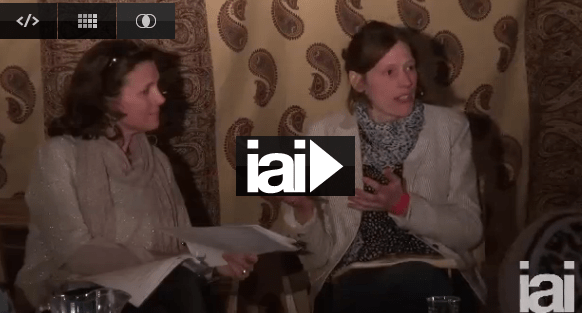 Still from a video: two women talking